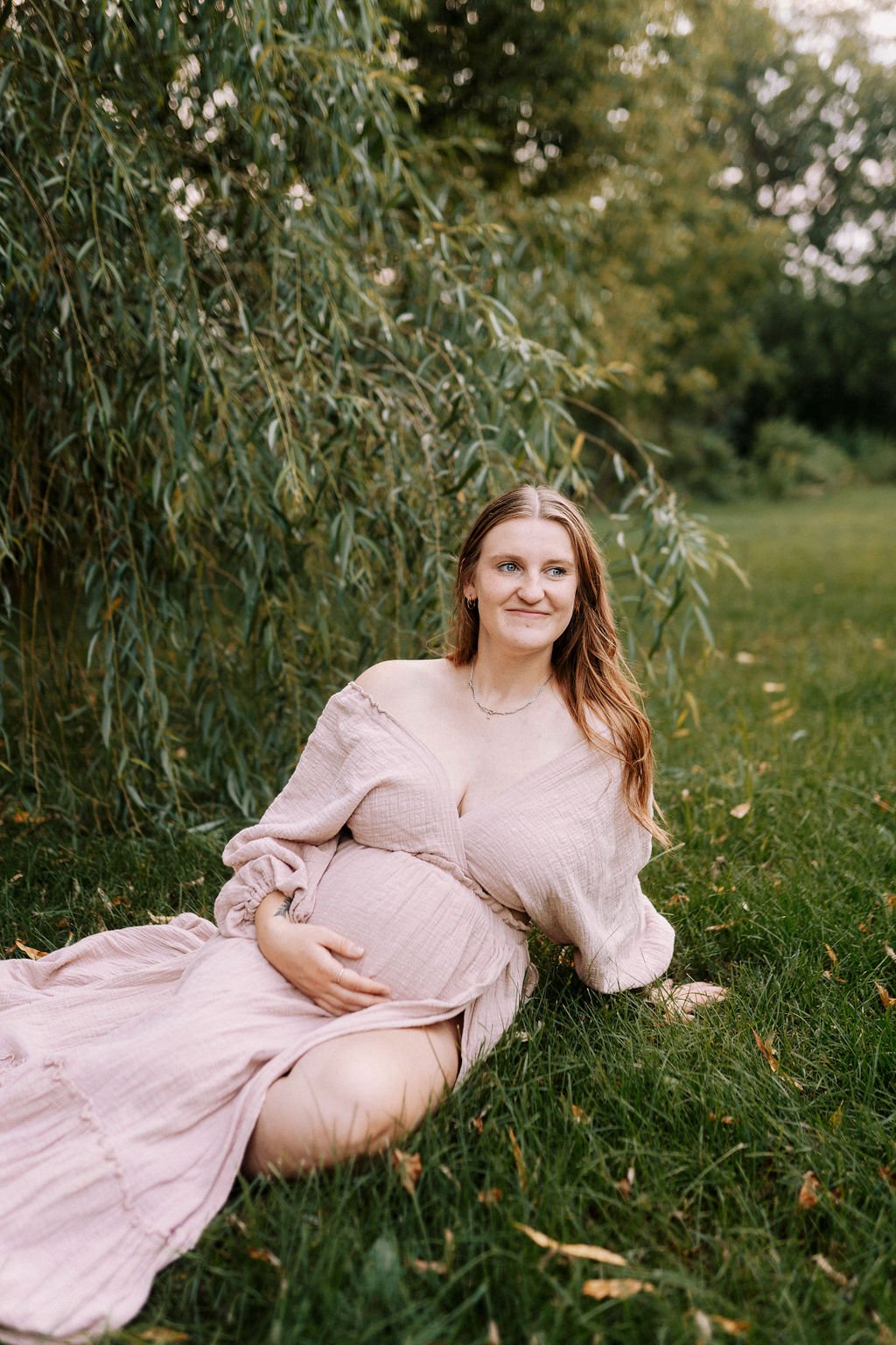 Maternity session on the family farm at golden hour